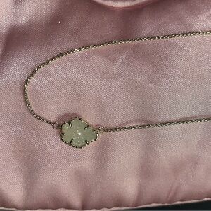 Kendra Scott gold and silver pendant necklace